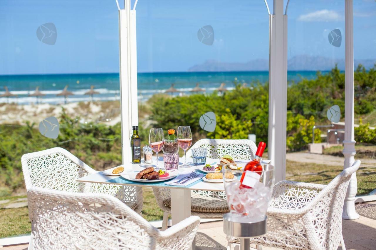 ホテル グルーポテル パルク ナチュラル＆スパ プラヤ・デ・ムロ エクステリア 写真 Beachfront dining at the Hotel